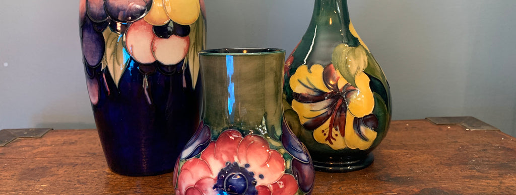 Three floral glazed vases